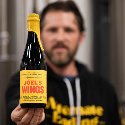 Joel’s Wings Imperial Stout 10.5% Aged in Whiskey Barrels for 14 months 