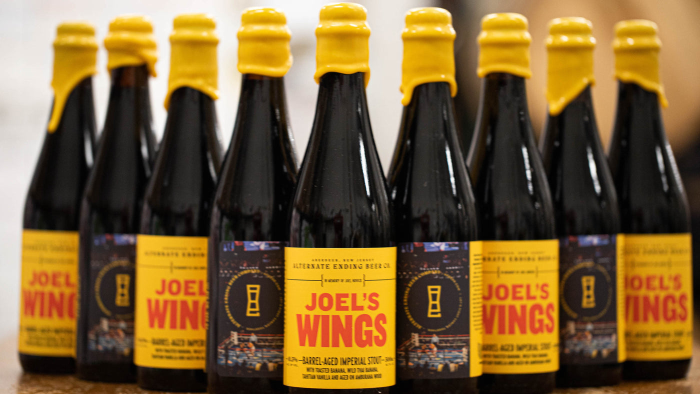 Joel’s Wings Imperial Stout 10.5% Aged in Whiskey Barrels for 14 months 